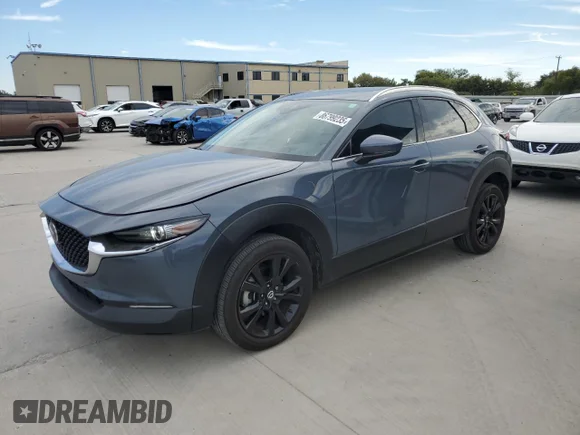 ✅ 2021 Mazda CX-30 Premium • VIN: 3MVDMBDL6MM310614 • Лот: 86799235. Опубліковано раніше на Copart з пробігом 76 992 миль. Безкоштовний доступ до архіву аукціонних продажів зі США та докладний звіт про історію автомобіля на DreamBid. Зображення 1.