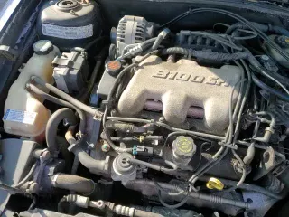 2000 Chevrolet Malibu LS z VIN 1G1NE52J4Y6191661, wystawiony jako Copart lot #83707804 z przebiegiem 52 787 mil mil oraz Szkoda całkowita • Salvage title. Historia ofert i sprzedaży dostępna na DreamBid. Obrazek 13.