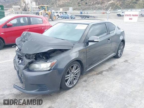 ✅ 2013 Scion tC • VIN: JTKJF5C74D3052964 • Lot: 41804627. Wystawiony na IAAI z przebiegiem 244 013 mil. Bezpłatny archiwum sprzedaży aukcyjnych z USA i szczegółowy raport historii pojazdu na DreamBid. Zdjęcie 2.