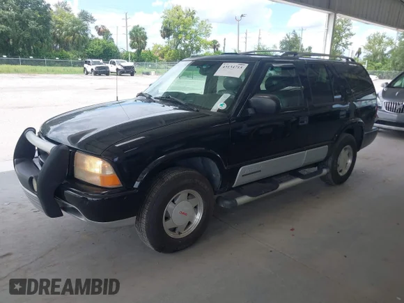 ✅ 2001 GMC Jimmy • VIN: 1GKCS63W812105518 • Lot: 43134715. Listed on IAAI with 164,023 mi. Free auction sales archive from the USA and detailed vehicle history report at DreamBid. Image 2.