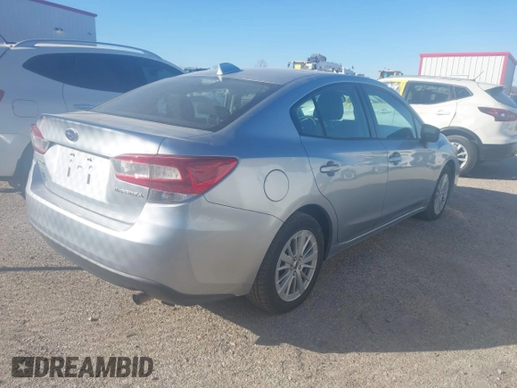 ✅ 2018 Subaru Impreza Premium • VIN: 4S3GKAD64J3600582 • Lot: 44169462. Wystawiony na IAAI z przebiegiem 87 267 mil. Bezpłatny archiwum sprzedaży aukcyjnych z USA i szczegółowy raport historii pojazdu na DreamBid. Zdjęcie 4.