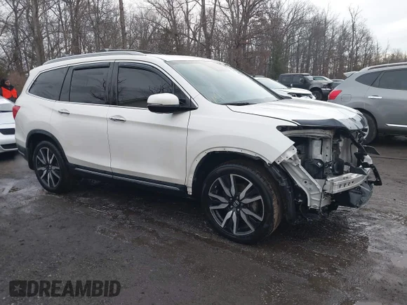 ✅ 2019 Honda Pilot Elite • VIN: 5FNYF6H07KB000106 • Лот: 43955140. Опубликован ранее на IAAI с пробегом 128 484 миль. Бесплатный доступ к архиву аукционных продаж из США и подробный отчёт об истории автомобиля на DreamBid. Изображение 1.
