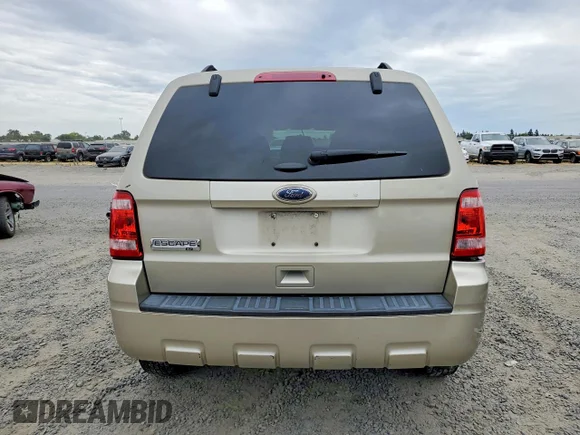 ✅ 2012 Ford Escape XLT • VIN: 1FMCU9D76CKC46083 • Lot: 60760316. Wystawiony na Copart z przebiegiem 127 873 mil. Bezpłatny archiwum sprzedaży aukcyjnych z USA i szczegółowy raport historii pojazdu na DreamBid. Zdjęcie 6.