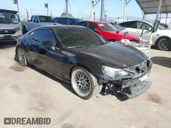 ✅ 2015 Subaru BRZ Limited • VIN: JF1ZCAC13F9601700 • Lot: 44298779. Listed on IAAI with 102,944 mi. Free auction sales archive from the USA and detailed vehicle history report at DreamBid. Image 1.