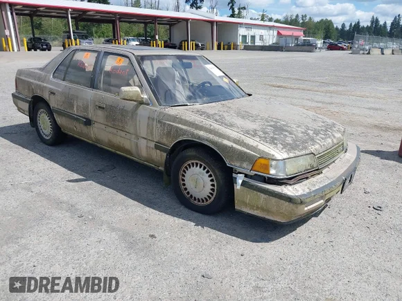 ✅ 1990 Acura Legend • VIN: JH4KA4667LC040814 • Lot: 42639592. Wystawiony na IAAI z przebiegiem 151 008 mil. Bezpłatny archiwum sprzedaży aukcyjnych z USA i szczegółowy raport historii pojazdu na DreamBid. Zdjęcie 1.