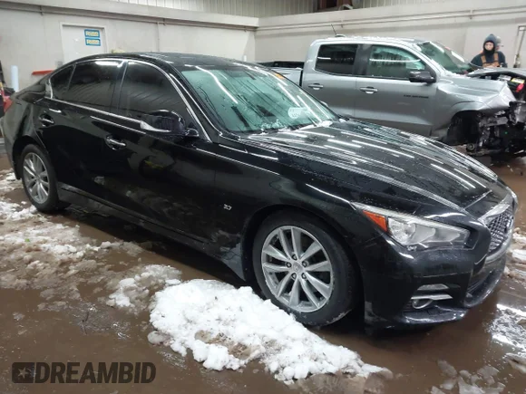 ✅ 2015 Infiniti Q50 Premium • VIN: JN1BV7AR7FM414056 • Lot: 44261960. Listed on IAAI with 149,161 mi. Free auction sales archive from the USA and detailed vehicle history report at DreamBid. Image 1.