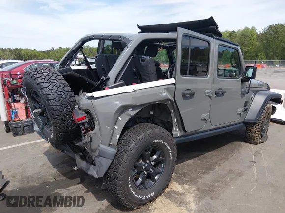 ✅ 2021 Jeep Wrangler Unlimited Willys • VIN: 1C4HJXDG9MW692522 • Lot: 44795154. Wystawiony na IAAI z przebiegiem 50 721 mil. Bezpłatny archiwum sprzedaży aukcyjnych z USA i szczegółowy raport historii pojazdu na DreamBid. Zdjęcie 4.