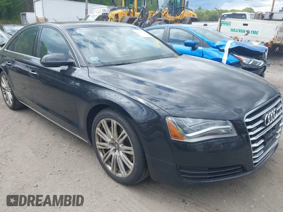 ✅ 2014 Audi A8 3.0T • VIN: WAUAGAFDXEN009974 • Lot: 42182155. Listed on IAAI with 118,930 mi. Free auction sales archive from the USA and detailed vehicle history report at DreamBid. Image 1.