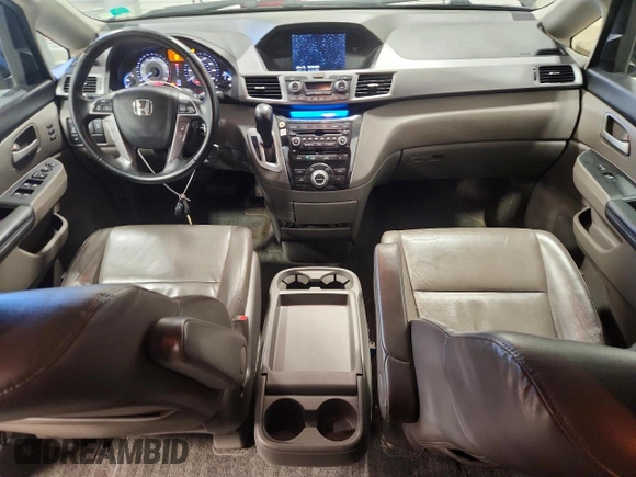 ✅ 2012 Honda Odyssey Touring • VIN: 5FNRL5H96CB034609 • Lot: 97123965. Listed on Copart with 234,973 mi. Free auction sales archive from the USA and detailed vehicle history report at DreamBid. Image 8.