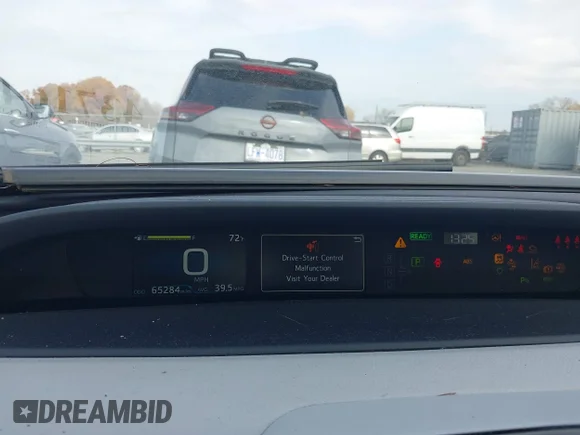 ✅ 2021 Toyota Prius LE • VIN: JTDKAMFU1M3142837 • Лот: 43716467. Опубліковано раніше на IAAI з пробігом 65 284 миль. Безкоштовний доступ до архіву аукціонних продажів зі США та докладний звіт про історію автомобіля на DreamBid. Зображення 7.
