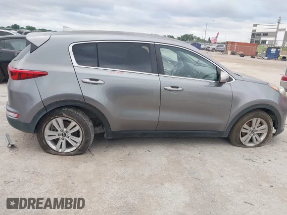 ✅ 2017 Kia Sportage LX • VIN: KNDPM3AC4H7160480 • Lot: 45310032. Wystawiony na IAAI z przebiegiem 122 074 mil. Bezpłatny archiwum sprzedaży aukcyjnych z USA i szczegółowy raport historii pojazdu na DreamBid. Zdjęcie 6.