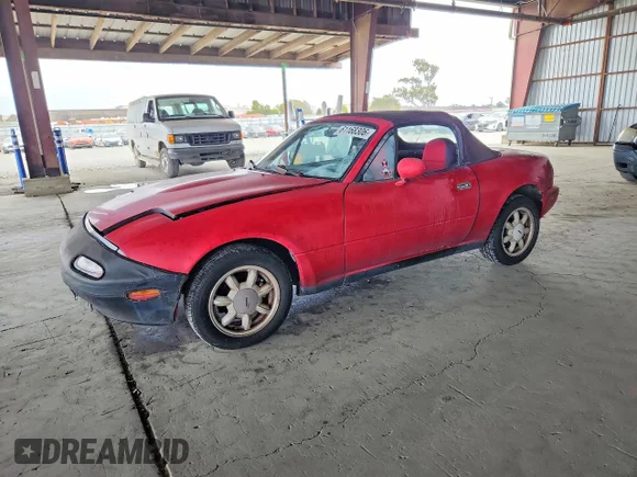 ✅ 1992 Mazda MX-5 Miata • VIN: JM1NA3516N1304179 • Lot: 61168306. Listed on Copart with 250,603 mi. Free auction sales archive from the USA and detailed vehicle history report at DreamBid. Image 1.