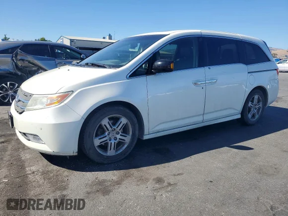 ✅ 2013 Honda Odyssey Touring • VIN: 5FNRL5H92DB091178 • Lot: 55646856. Wystawiony na Copart z przebiegiem 152 291 mil. Bezpłatny archiwum sprzedaży aukcyjnych z USA i szczegółowy raport historii pojazdu na DreamBid. Zdjęcie 1.