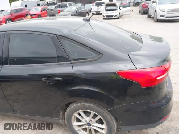 ✅ 2015 Ford Focus SE • VIN: 1FADP3F28FL384288 • Лот: 44906454. Опубликован ранее на IAAI с пробегом 98 724 миль. Бесплатный доступ к архиву аукционных продаж из США и подробный отчёт об истории автомобиля на DreamBid. Изображение 6.