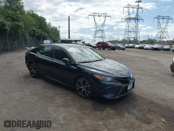✅ 2019 Toyota Camry LE • VIN: 4T1B11HKXKU813452 • Лот: 45248078. Опубліковано раніше на IAAI з пробігом 72 800 миль. Безкоштовний доступ до архіву аукціонних продажів зі США та докладний звіт про історію автомобіля на DreamBid. Зображення 1.