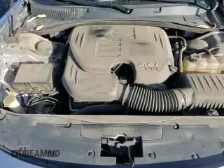 2018 Dodge Charger SXT Plus z VIN 2C3CDXHG7JH162849, wystawiony jako Copart lot #90515255 z przebiegiem 74 757 mil mil oraz Szkoda całkowita • Salvage title. Historia ofert i sprzedaży dostępna na DreamBid. Obrazek 13.