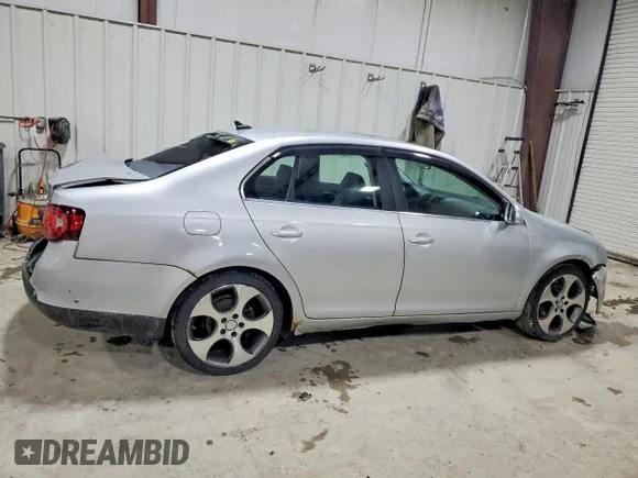 ✅ 2009 Volkswagen Jetta SE • VIN: 3VWRZ71K89M016900 • Lot: 98048575. Listed on Copart with 153,680 mi. Free auction sales archive from the USA and detailed vehicle history report at DreamBid. Image 3.
