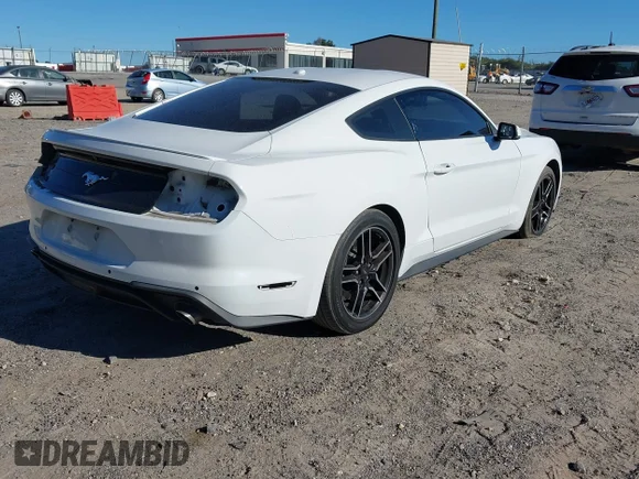 ✅ 2020 Ford Mustang EcoBoost Premium • VIN: 1FA6P8TH3L5120121 • Lot: 43395963. Wystawiony na IAAI z przebiegiem 69 603 mil. Bezpłatny archiwum sprzedaży aukcyjnych z USA i szczegółowy raport historii pojazdu na DreamBid. Zdjęcie 4.