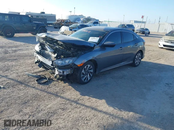 ✅ 2018 Honda Civic LX • VIN: SHHFK7H22JU428706 • Lot: 43920612. Wystawiony na IAAI z przebiegiem 121 158 mil. Bezpłatny archiwum sprzedaży aukcyjnych z USA i szczegółowy raport historii pojazdu na DreamBid. Zdjęcie 2.