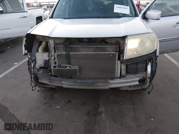 ✅ 2009 Honda Pilot Touring • VIN: 5FNYF38959B002380 • Lot: 44069494. Wystawiony na IAAI z przebiegiem 190 320 mil. Bezpłatny archiwum sprzedaży aukcyjnych z USA i szczegółowy raport historii pojazdu na DreamBid. Zdjęcie 6.
