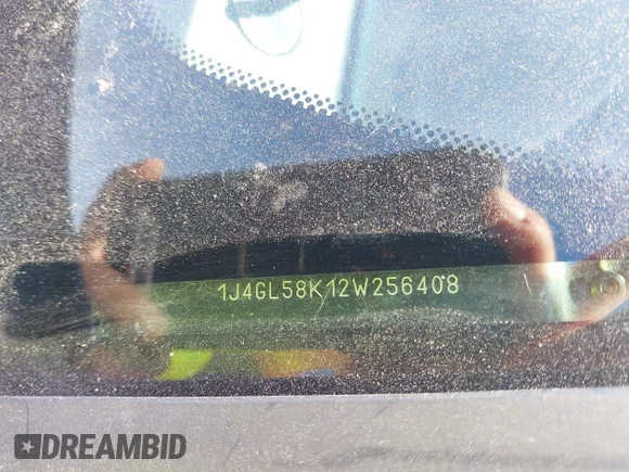 ✅ 2002 Jeep Liberty Limited • VIN: 1J4GL58K12W256408 • Lot: 42117273. Listed on IAAI with 190,807 mi. Free auction sales archive from the USA and detailed vehicle history report at DreamBid. Image 9.