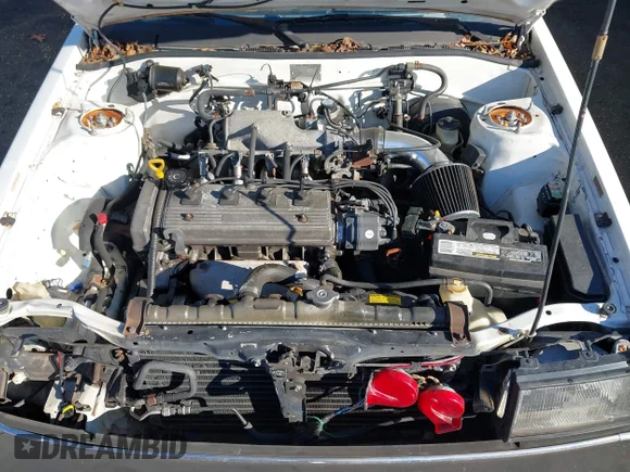 ✅ 1987 Toyota Corolla • VIN: JT2AE83E7H3436892 • Lot: 43805383. Wystawiony na IAAI z przebiegiem 83 556 mil. Bezpłatny archiwum sprzedaży aukcyjnych z USA i szczegółowy raport historii pojazdu na DreamBid. Zdjęcie 10.