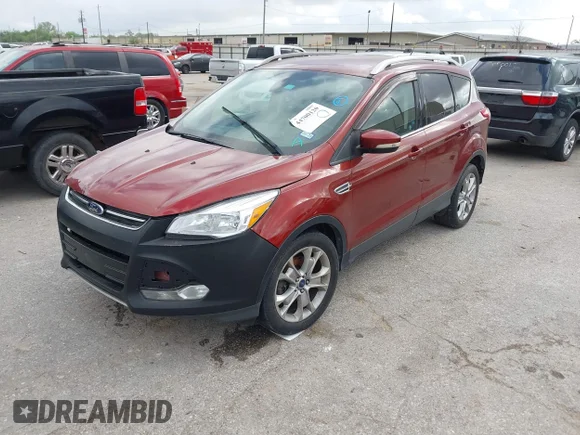 ✅ 2015 Ford Escape Titanium • VIN: 1FMCU9JX6FUA86266 • Lot: 44700120. Listed on IAAI with 130,715 mi. Free auction sales archive from the USA and detailed vehicle history report at DreamBid. Image 2.