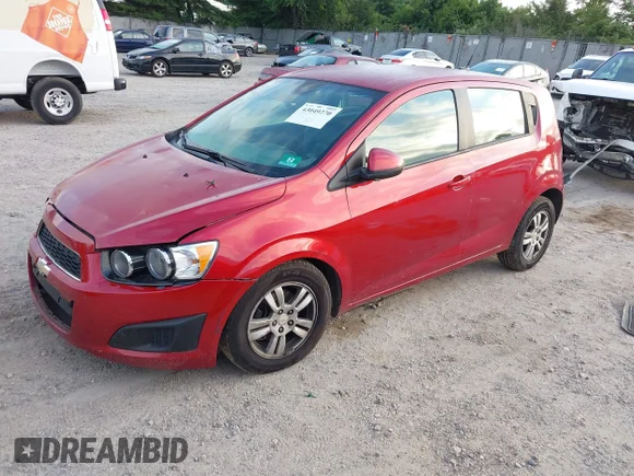 ✅ 2012 Chevrolet Sonic LS • VIN: 1G1JA6SH3C4120288 • Lot: 43049270. Listed on IAAI with 121,829 mi. Free auction sales archive from the USA and detailed vehicle history report at DreamBid. Image 2.