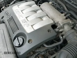 ✅ 2002 Kia Spectra GS • VIN: KNAFB161025058378 • Lot: 42222134. Listed on IAAI with 154,576 mi. Free auction sales archive from the USA and detailed vehicle history report at DreamBid. Image 14.