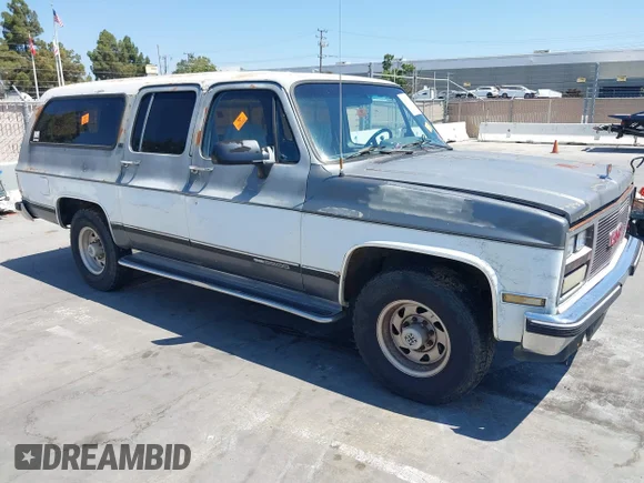 ✅ 1990 GMC Suburban • VIN: 1GKGR26NXLF528203 • Lot: 42731684. Listed on IAAI with 185,736 mi. Free auction sales archive from the USA and detailed vehicle history report at DreamBid. Image 1.