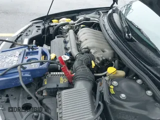 ✅ 1997 Chrysler Sebring JXi • VIN: 3C3EL55HXVT513229 • Lot: 42926314. Listed on IAAI with 129,584 mi. Free auction sales archive from the USA and detailed vehicle history report at DreamBid. Image 12.