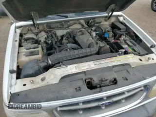 ✅ 1999 Ford Explorer XL • VIN: 1FMZU32X4XZB11031 • Lot: 82640184. Wystawiony na Copart z przebiegiem 149 331 mil. Bezpłatny archiwum sprzedaży aukcyjnych z USA i szczegółowy raport historii pojazdu na DreamBid. Zdjęcie 14.