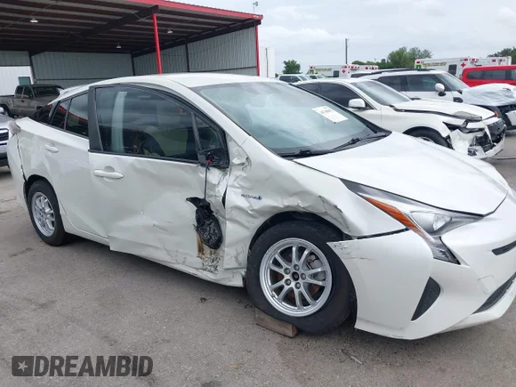 ✅ 2016 Toyota Prius Four Touring • VIN: JTDKARFU6G3014014 • Lot: 44748695. Wystawiony na IAAI z przebiegiem 99 269 mil. Bezpłatny archiwum sprzedaży aukcyjnych z USA i szczegółowy raport historii pojazdu na DreamBid. Zdjęcie 6.