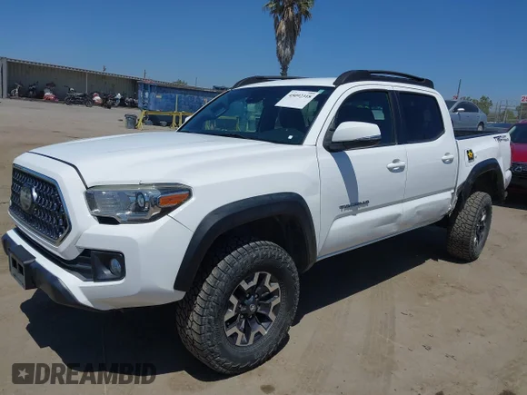 ✅ 2019 Toyota Tacoma SR5 • VIN: 3TMAZ5CN1KM082478 • Lot: 45092318. Wystawiony na IAAI z przebiegiem 128 411 mil. Bezpłatny archiwum sprzedaży aukcyjnych z USA i szczegółowy raport historii pojazdu na DreamBid. Zdjęcie 2.