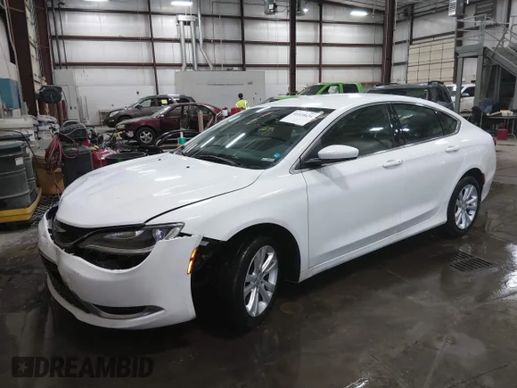 ✅ 2015 Chrysler 200 Limited • VIN: 1C3CCCAB1FN702026 • Лот: 45328634. Опубліковано раніше на IAAI з пробігом 135 343 миль. Безкоштовний доступ до архіву аукціонних продажів зі США та докладний звіт про історію автомобіля на DreamBid. Зображення 2.