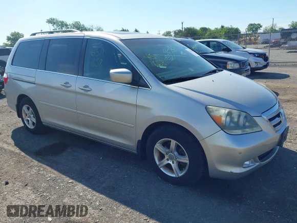 ✅ 2006 Honda Odyssey Touring • VIN: 5FNRL38806B125634 • Лот: 45111658. Опубліковано раніше на IAAI з пробігом 163 564 миль. Безкоштовний доступ до архіву аукціонних продажів зі США та докладний звіт про історію автомобіля на DreamBid. Зображення 1.