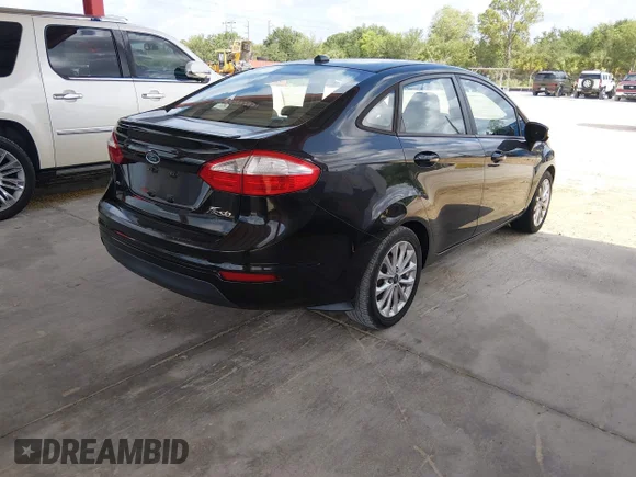 ✅ 2014 Ford Fiesta SE • VIN: 3FADP4BJ8EM127518 • Lot: 45205476. Wystawiony na IAAI z przebiegiem 155 483 mil. Bezpłatny archiwum sprzedaży aukcyjnych z USA i szczegółowy raport historii pojazdu na DreamBid. Zdjęcie 4.