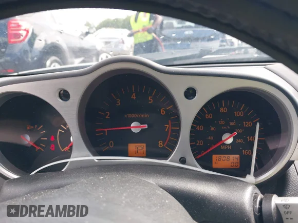 ✅ 2004 Nissan 350Z Touring • VIN: JN1AZ36A94T013851 • Lot: 42335966. Wystawiony na IAAI z przebiegiem 180 814 mil. Bezpłatny archiwum sprzedaży aukcyjnych z USA i szczegółowy raport historii pojazdu na DreamBid. Zdjęcie 7.