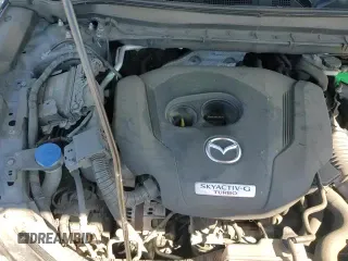 ✅ 2021 Mazda CX-5 Carbon Edition • VIN: JM3KFBCY5M0395245 • Лот: 85083565. Опубликован ранее на Copart с пробегом 86 497 миль. Бесплатный доступ к архиву аукционных продаж из США и подробный отчёт об истории автомобиля на DreamBid. Изображение 14.