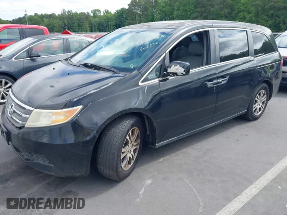 ✅ 2011 Honda Odyssey EX-L • VIN: 5FNRL5H6XBB010558 • Lot: 44939260. Listed on IAAI with 270,404 mi. Free auction sales archive from the USA and detailed vehicle history report at DreamBid. Image 2.
