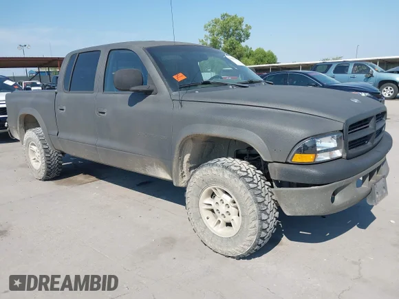 ✅ 2000 Dodge Dakota Sport • VIN: 1B7GG2AN3YS704483 • Lot: 43030307. Listed on IAAI with 228,593 mi. Free auction sales archive from the USA and detailed vehicle history report at DreamBid. Image 1.