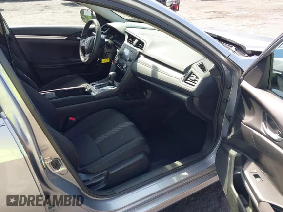 ✅ 2017 Honda Civic LX • VIN: 19XFC2F53HE007902 • Lot: 45482108. Wystawiony na IAAI z przebiegiem 59 831 mil. Bezpłatny archiwum sprzedaży aukcyjnych z USA i szczegółowy raport historii pojazdu na DreamBid. Zdjęcie 5.