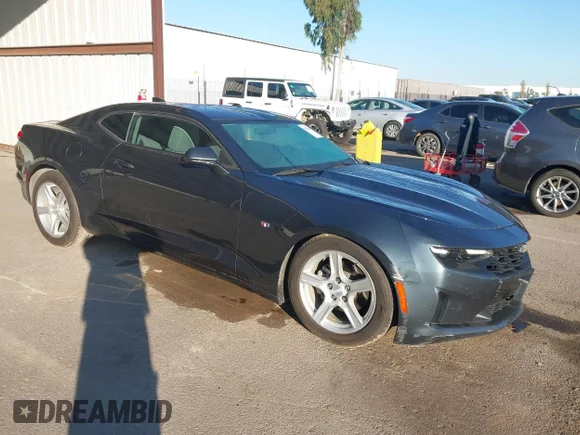 ✅ 2021 Chevrolet Camaro 1LS • VIN: 1G1FB1RX9M0138385 • Lot: 43768188. Listed on IAAI with 56,486 mi. Free auction sales archive from the USA and detailed vehicle history report at DreamBid. Image 1.