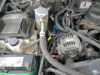 2003 Chevrolet Blazer LS z VIN 1GNCT18X23K154091, wystawiony jako Copart lot #41507405 z przebiegiem 166 019 mil mil oraz Szkoda całkowita • Salvage title. Historia ofert i sprzedaży dostępna na DreamBid. Obrazek 13.