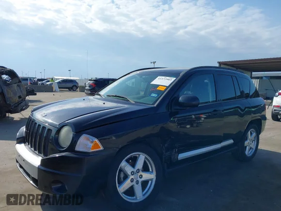 ✅ 2009 Jeep Compass Limited • VIN: 1J4FT57B39D119621 • Лот: 41572903. Опубліковано раніше на IAAI з пробігом 172 890 миль. Безкоштовний доступ до архіву аукціонних продажів зі США та докладний звіт про історію автомобіля на DreamBid. Зображення 6.