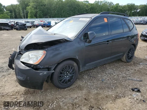 ✅ 2009 Kia Rondo LX • VIN: KNAFG528X97251695 • Лот: 59810185. Опубліковано раніше на Copart з пробігом 180 065 миль. Безкоштовний доступ до архіву аукціонних продажів зі США та докладний звіт про історію автомобіля на DreamBid. Зображення 1.
