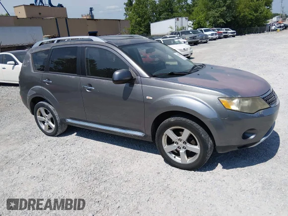 ✅ 2009 Mitsubishi Outlander XLS • VIN: JA4MT41X79Z007090 • Lot: 45023980. Listed on IAAI with 218,952 mi. Free auction sales archive from the USA and detailed vehicle history report at DreamBid. Image 1.