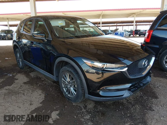 ✅ 2018 Mazda CX-5 Sport • VIN: JM3KFABM5J1387242 • Lot: 45091030. Listed on IAAI with 17,015 mi. Free auction sales archive from the USA and detailed vehicle history report at DreamBid. Image 1.