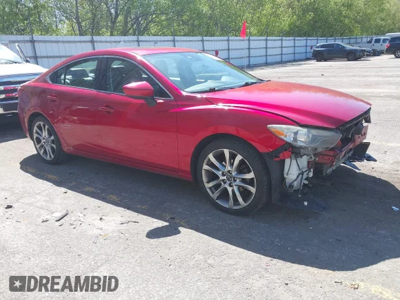 ✅ 2014 Mazda 6 i Grand Touring • VIN: JM1GJ1W64E1152538 • Lot: 45020138. Listed on IAAI with 194,831 mi. Free auction sales archive from the USA and detailed vehicle history report at DreamBid. Image 1.