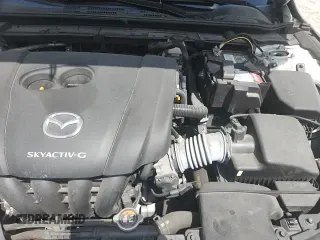 ✅ 2021 Mazda 3 S • VIN: JM1BPAJL0M1306554 • Lot: 70041405. Wystawiony na Copart z przebiegiem 9 999 mil. Bezpłatny archiwum sprzedaży aukcyjnych z USA i szczegółowy raport historii pojazdu na DreamBid. Zdjęcie 13.